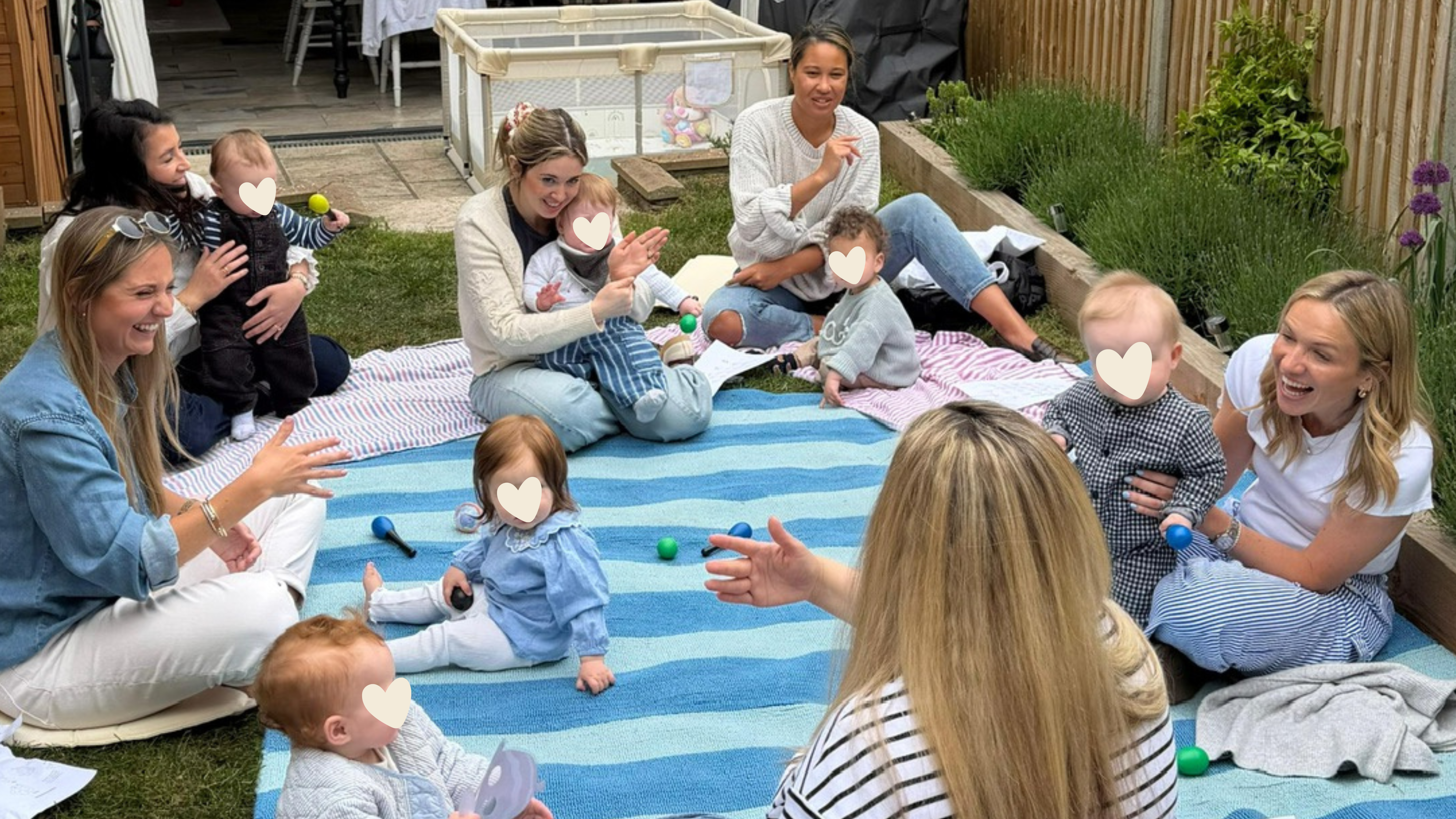 Mums and babies sitting together on picnic blankets during a Mum Brunch Session